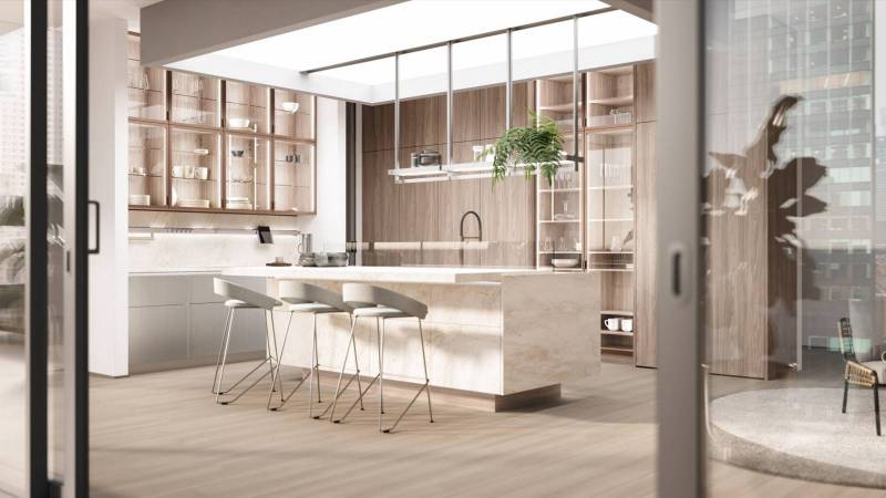 Cuisine haut de gamme en pierre et bois, épurée et sans poignée, offrant un design moderne, chaleureux et minimaliste pour tout intérieur